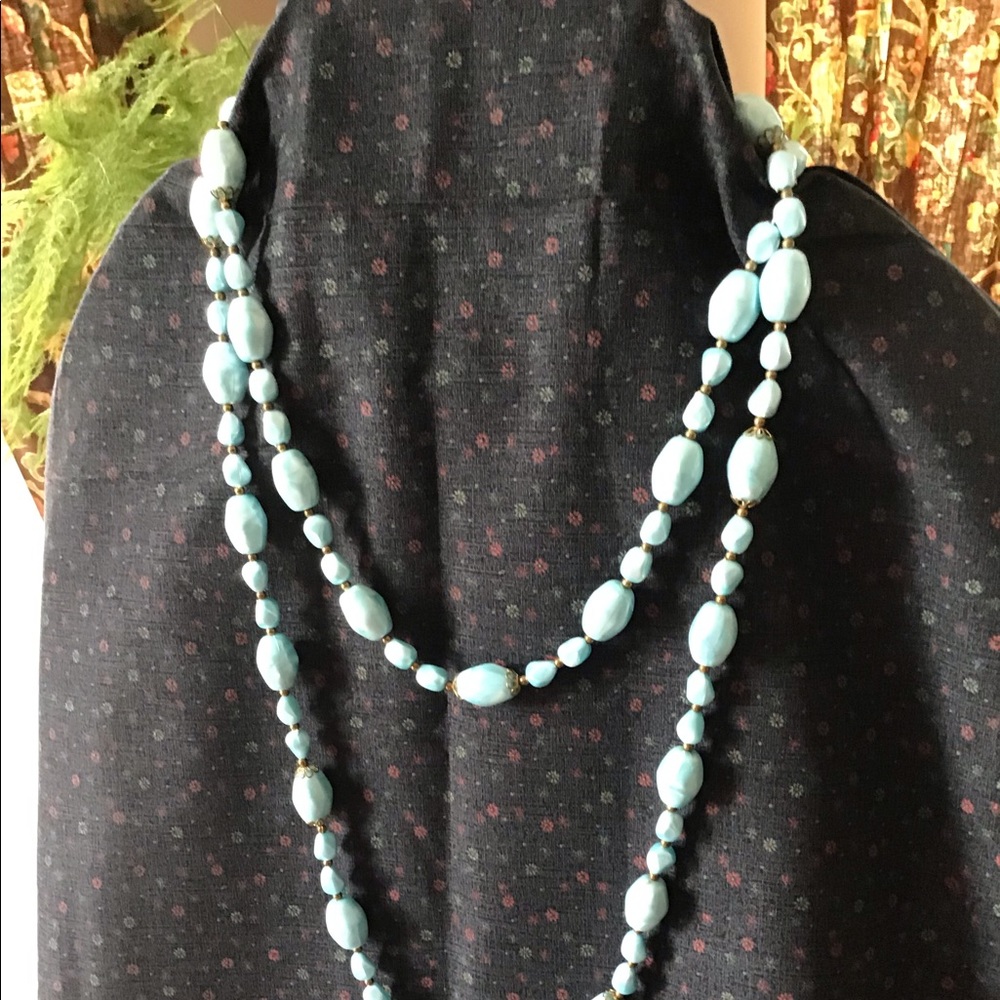 Pale blue long beaded necklace 54”